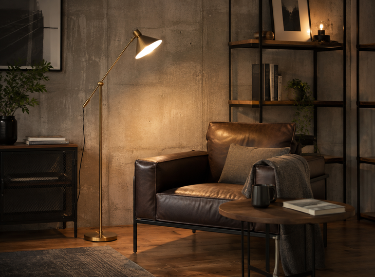 Reading nook with an industrial-style metal lamp